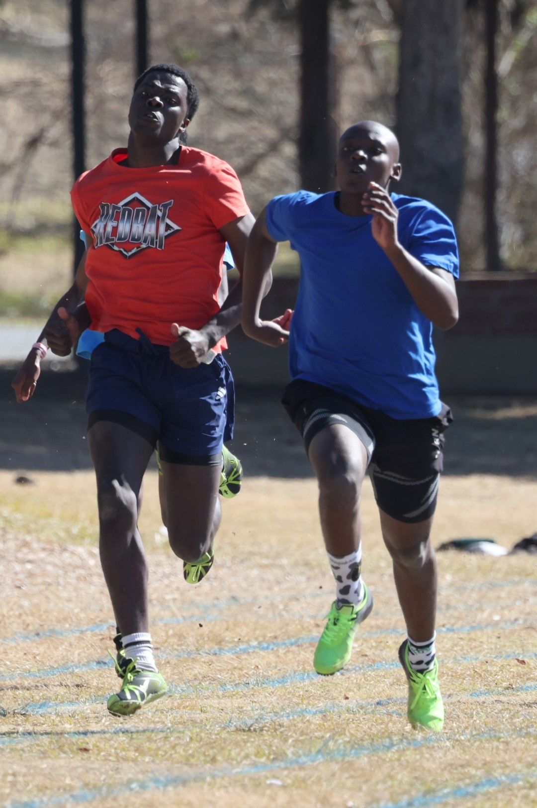 Junior and Takudzwa battling it out in the 200m